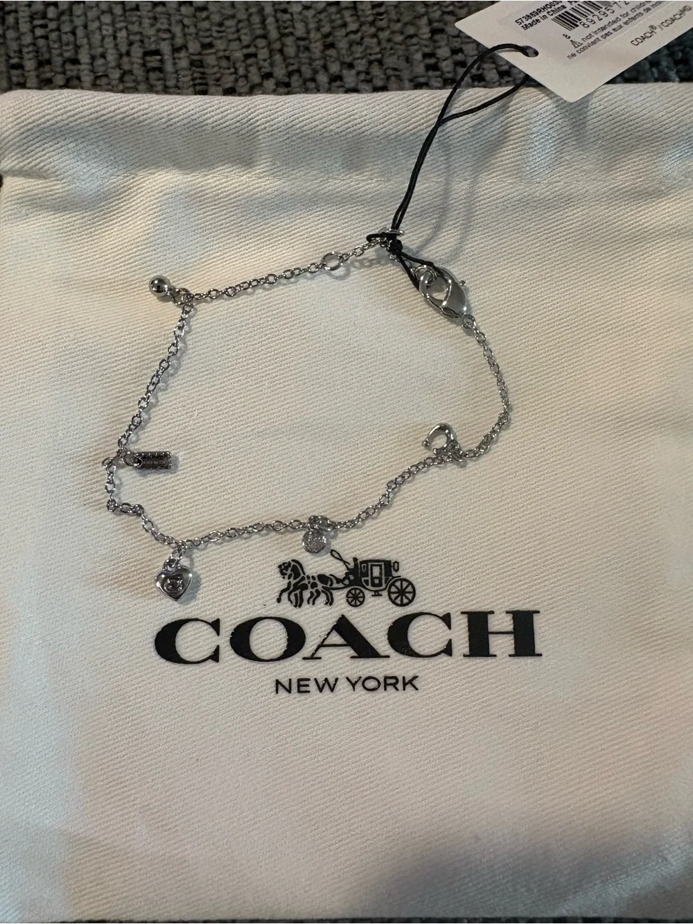 COACH Silver Charm Bracelet with Signature Carriage Charm